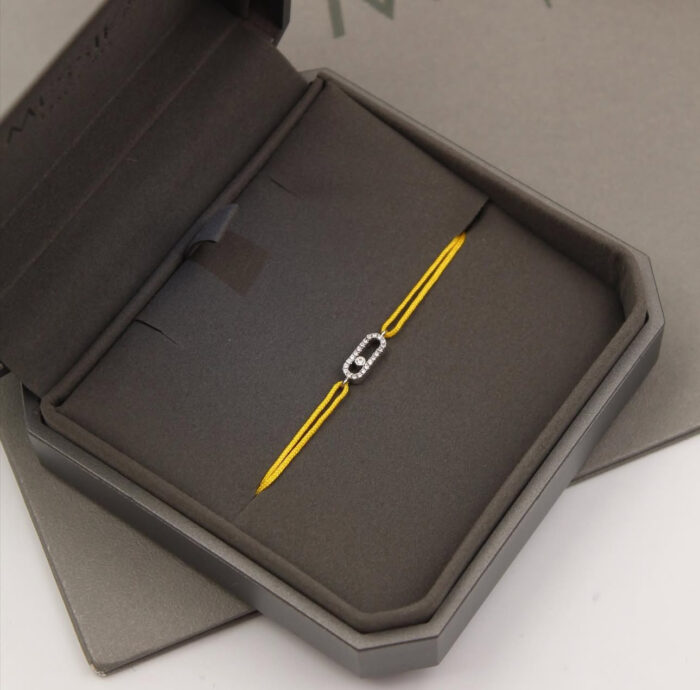 Move uno bracelet with yellow ribbon